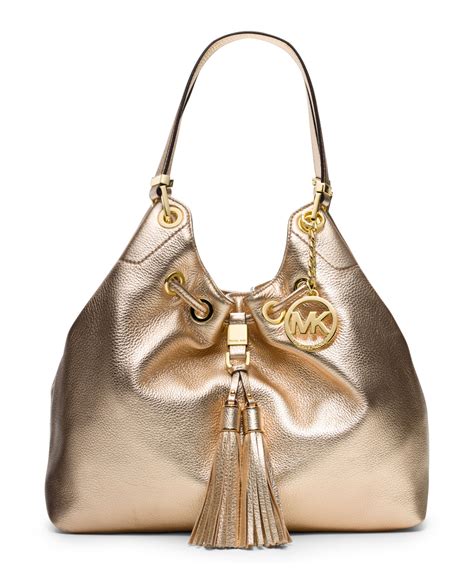 michael kors leather and gold tassel lariat|Michael Kors handbags.